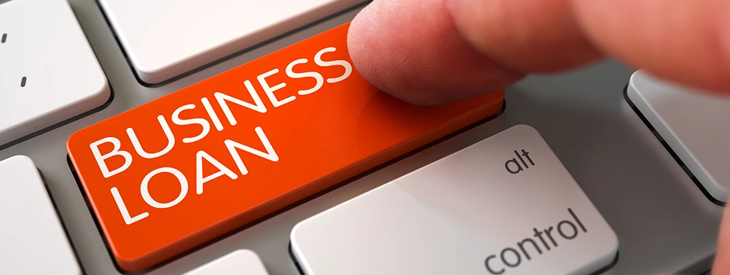 Business handshake over documents